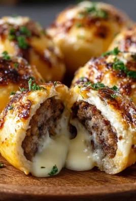 Garlic Parmesan Cheeseburger Bombs served on a plate