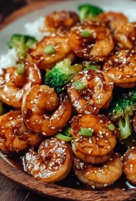 High-protein honey garlic shrimp served in a bowl with garnishes
