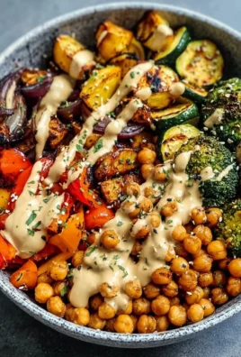 Roasted Veggie Chickpea Bowls with Maple Dijon Tahini Dressing on a plate