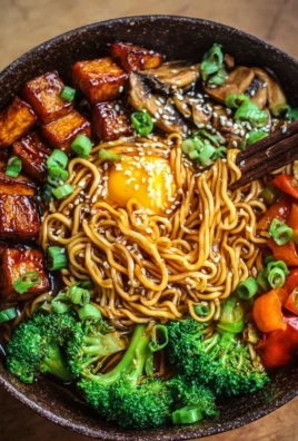 Delicious Vegan Teriyaki Noodle Bowl with fresh veggies and teriyaki sauce