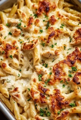 Baked Chicken Alfredo Pasta served in a creamy sauce with chicken and pasta