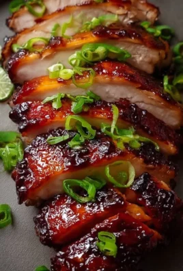 Deliciously cooked Char Siu Chicken served with vibrant vegetables