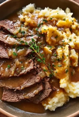 Classic round steak served with savory gravy on a plate