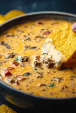 Creamy Cowboy Queso dip served with tortilla chips