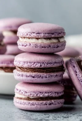 Deliciously colorful French macarons arranged on a plate