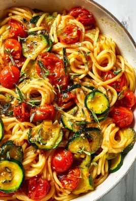 Fresh Garden Tomato Zucchini Pasta with vibrant vegetables and herbs