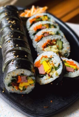 Kimbap Korean seaweed rice rolls filled with vegetables and proteins.