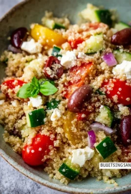 Mediterranean quinoa salad with fresh vegetables and herbs