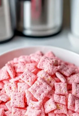 Quick strawberry shortcake puppy chow for a delightful snack.