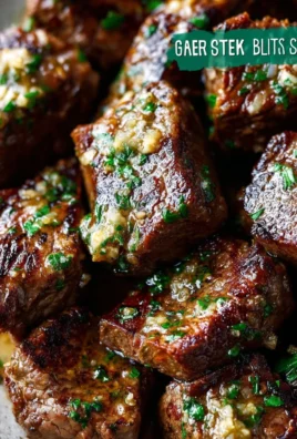 Delicious garlic butter steak bites served on a white plate