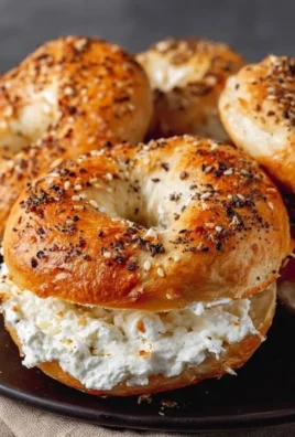 Homemade 3-ingredient cottage cheese bagels on a wooden board.