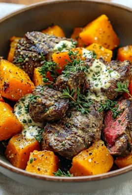 Butternut squash and garlic herb steak bowls with vibrant colors and textures