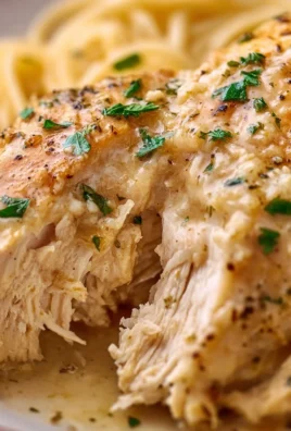 Crock Pot Angel Chicken dish with herbs and spices cooked in a slow cooker.