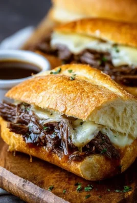 Delicious Crockpot French Dip Sandwiches served with au jus for dipping