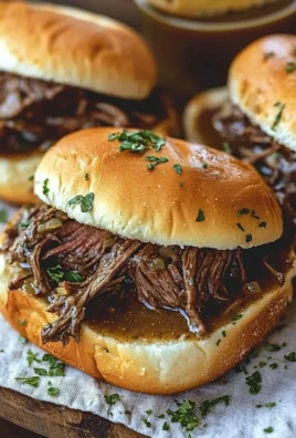 Delicious Crockpot French Dip Sandwiches with beef and cheese ready to serve.