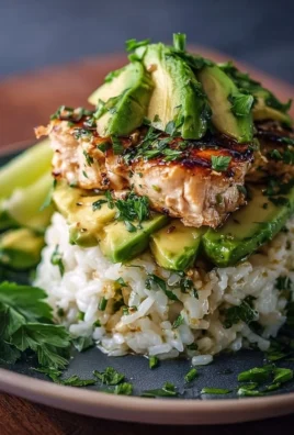 Honey Lime Chicken served with a delicious avocado rice stack
