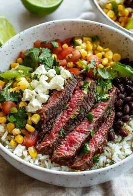 Delicious Flank Steak Bowl with fresh vegetables and grains