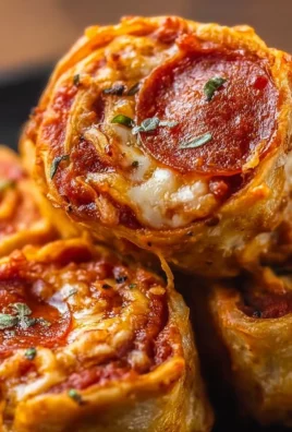 High protein pepperoni pizza rolls on a plate, ready to eat