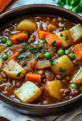 A bowl of hearty Irish vegetarian stew with colorful vegetables and herbs.