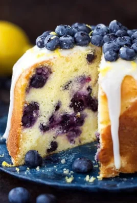 Delicious Lemon Blueberry Cake with fresh blueberries and lemon zest