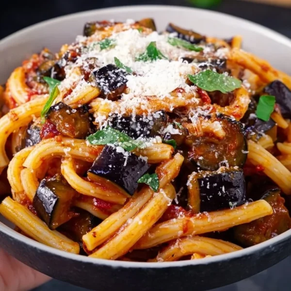 Delicious Pasta in the Style of Norma served with fresh ingredients.