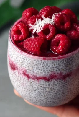 Delicious Raspberry Chia Pudding in a bowl with fresh raspberries on top