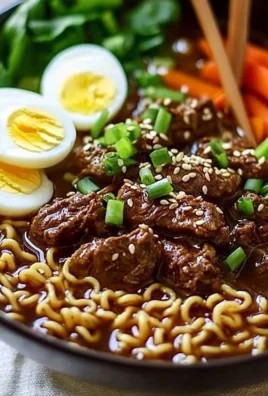 Delicious slow cooker beef ramen noodles with rich broth and toppings.