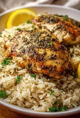 Delicious slow cooker lemon herb chicken served with rice