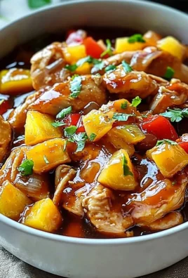 Delicious Sweet Hawaiian Chicken cooked in a crockpot with vibrant flavors.